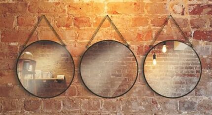 GreyZouq Set of three black rimmed round 25cm mirrors