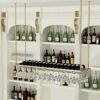 EYLINK Hanging Wine Rack From Ceiling， Modern Metal Wine Bottle Holder Wall Mounted Champagne Glass Goblets Stemware Rack Storage Shelf Gold Disp