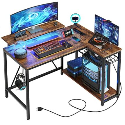 Bestier L Shaped Desk with Power Outlets & LED Lights Compact Corner Desk with Shelves Reversible Computer Desk with Hooks for Home Office Bedroo